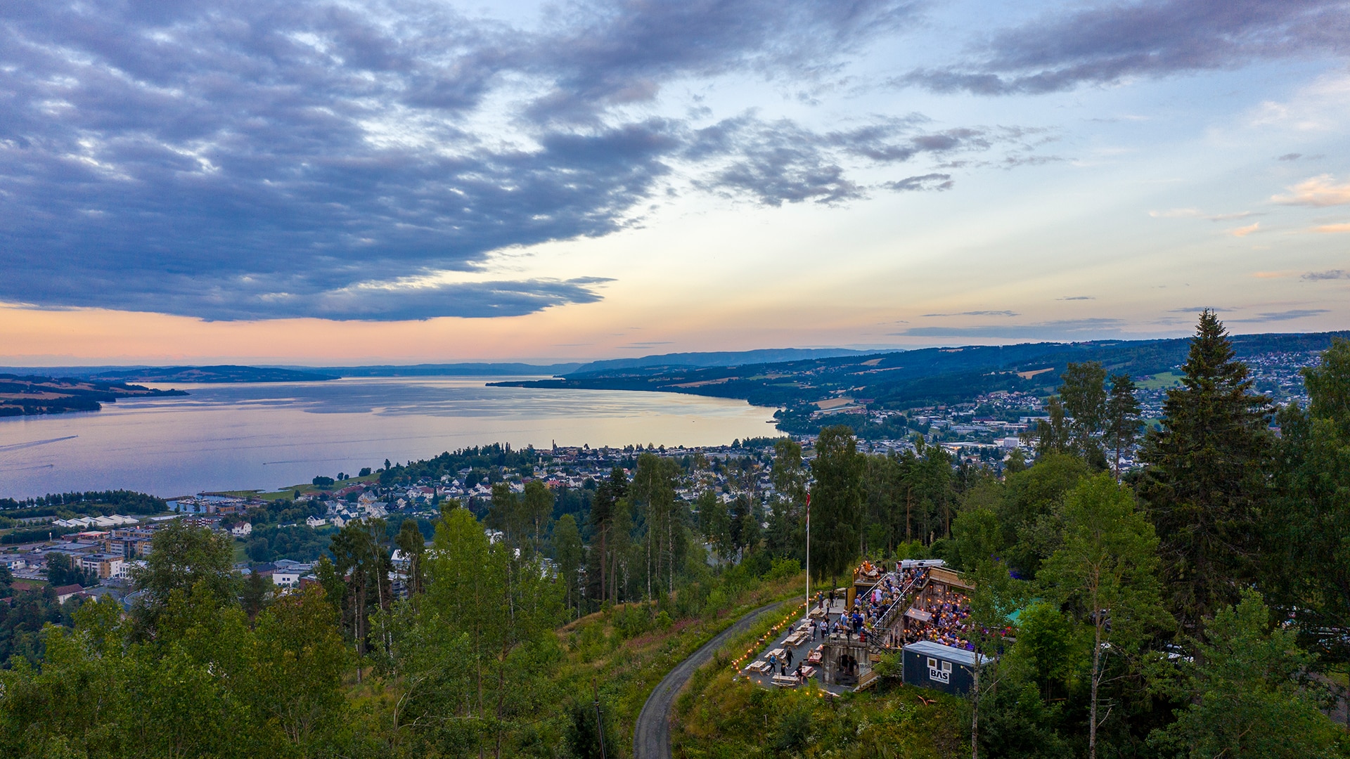 The view of Gjøvik and Mjøsa from Hovedtoppen at sunset in summertime.
